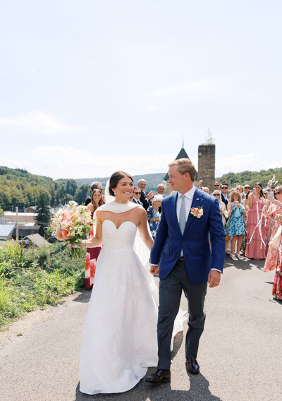 Bride and groom exiting wedding ceremony in Eagles Mere, Pennsylvania