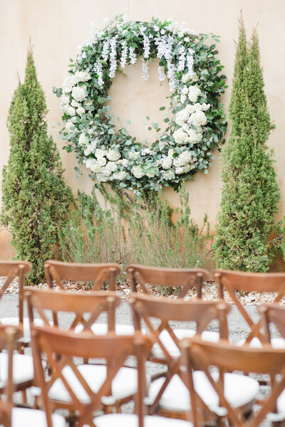 Modern tall centerpiece with baby's breath and phalaenopsis orchids