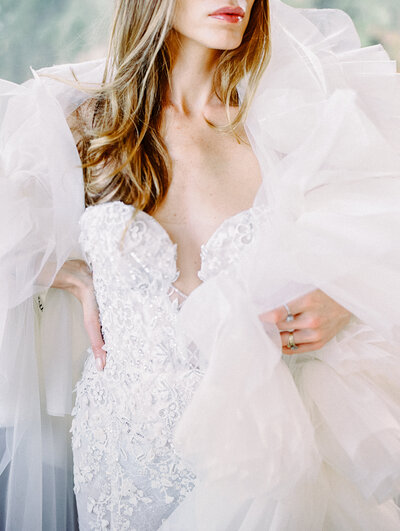 Bride in a plunging neckline and ruffled veil in Paris, photographed by New England  Wedding Photographer Ashley Helen