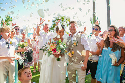 confettie falling on the bride and groom at their wedding in Marbella