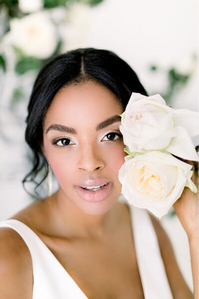 Portrait of a bride with her wedding flowers