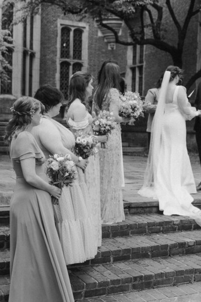 Bride and groom embracing lovingly during their New York City wedding.