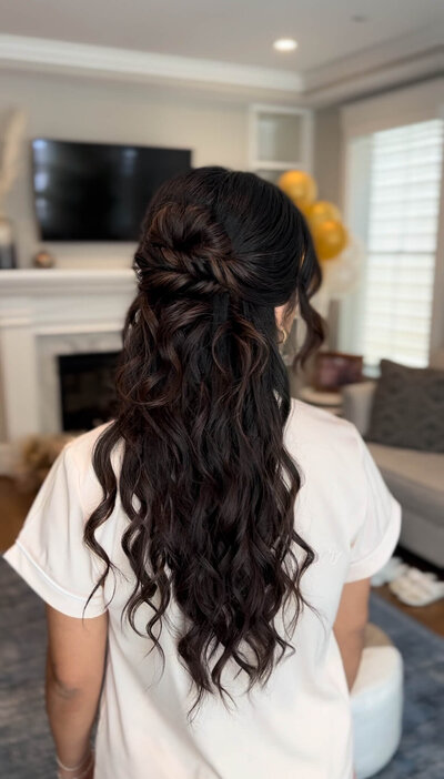 Bridesmaid with half-up, half-down hair and soft curls — romantic and versatile hairstyle by Klover Beauty for a wedding in Maryland.