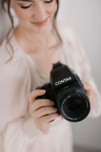 sf bay area photographer Laurel holding her film camera