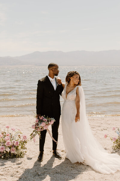 groom and bride at beach eloping