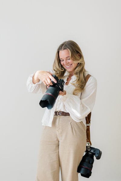 Amanda Shupe holding a camera