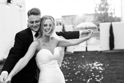 Bride and groom smiling playfully on wedding day by Winx Photo, knoxville wedding photographer