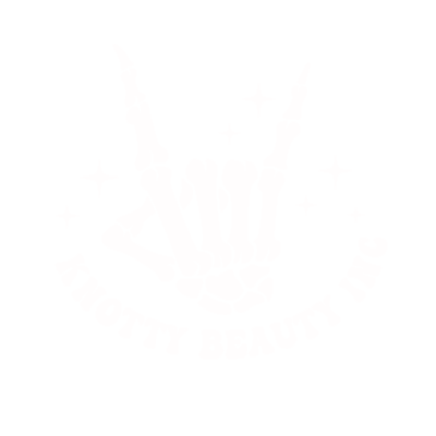 A skull hand doing the rock on symbol and the words Knotty Beauty Inc.