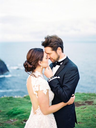 Romantic Cliffside Portrait of Bride and Groom at California Coastal Wedding