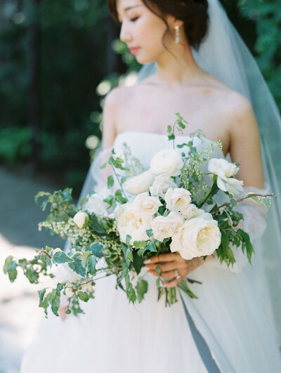 bride with white bouquet in california