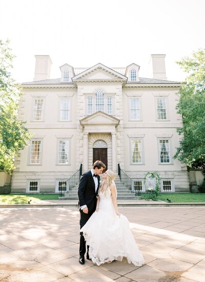 Bride and groom kissing at their wedding ceremony