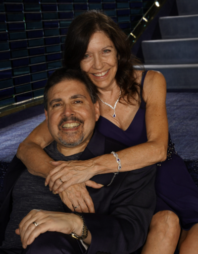 Staff headshot in front of neutral background.