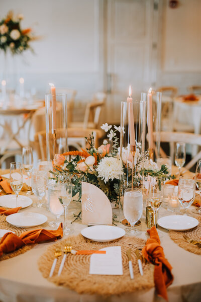 Stylish wedding floral arrangement featuring pastel roses, white hydrangeas, and eucalyptus, expertly arranged by Leigh Florist.