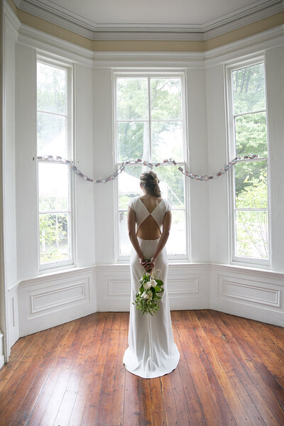 Bride in BHLDN dress at Awbury Arboretum
