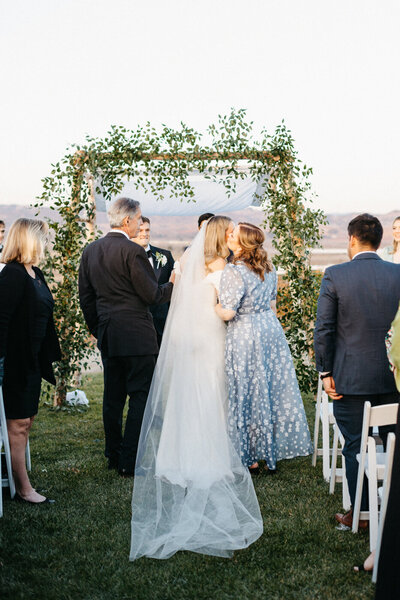 jewish wedding ceremony at viansa winery, bride kissing mom