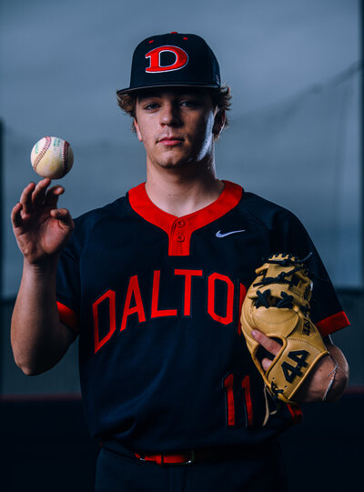 a baseball player poses for his sports photos in dalton ga