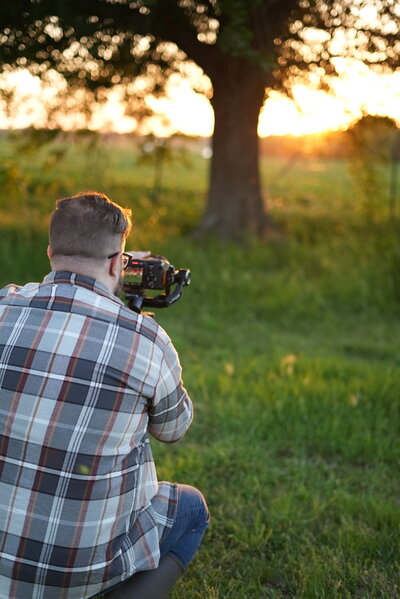 Ryan McMackin filming the sunset over the farm.