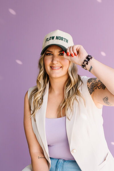 photographer leaning against table 