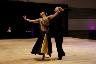 Morgan and her partner dancing for competition