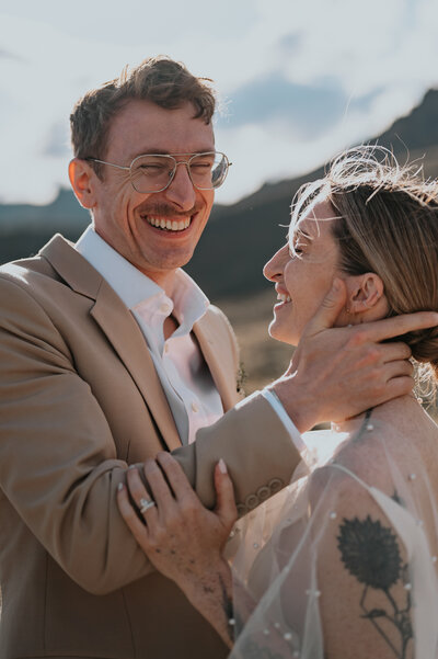 a bride and groom celebrating their elopement in cody wyoming