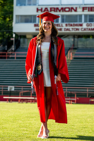 a high school senior during a cap and gown session in Dalton Georgia