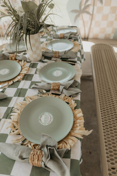 Table settings for beach themed birthday party planned by Fancy Chancey in San Diego CA