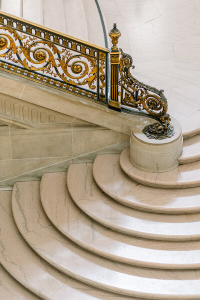 Luxurious spiral staircase photo by a Northern California Wedding Photographer, showcasing architectural beauty.