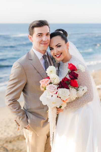 bride and groom on la jolla cliffs san diego