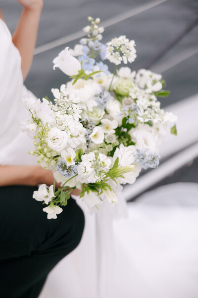 spring florals on boat wedding