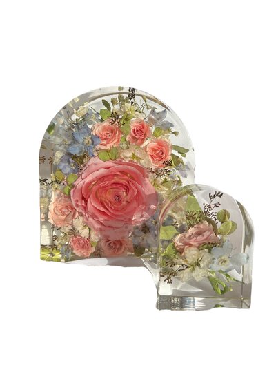 L shaped funeral arrangement that is on the inside of the casket lid