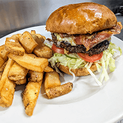 Prime Burger with Bacon at Max Dales Steak and Chop House in Mount Vernon