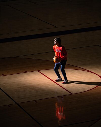 Senior Boy Taking Basketball Shot