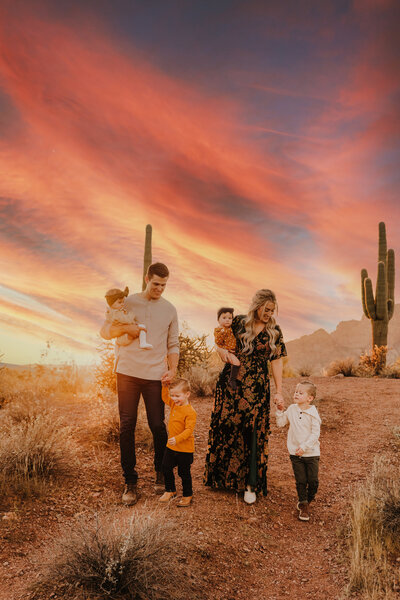 family photoshoot in desert at sunset