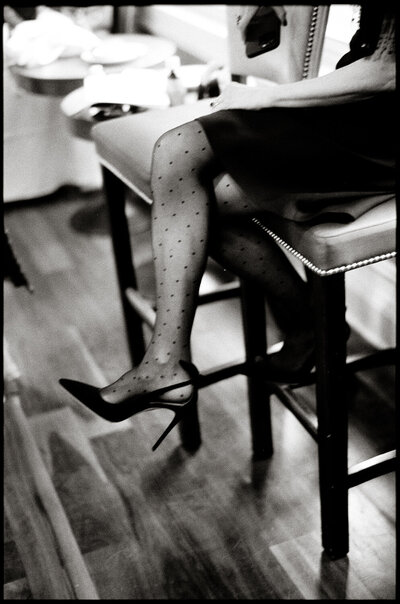 black and white photo of a womans leg. Taken on film.