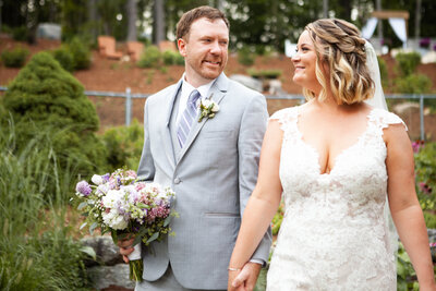 Bride and Groom Smiling at each other