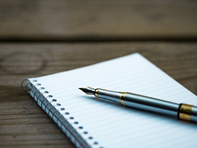 ink pen blank note book