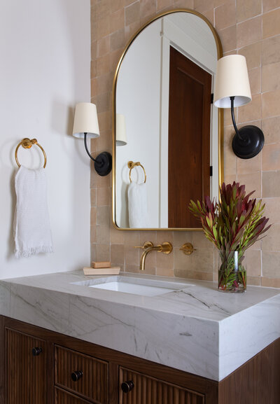 Pink and wood toned bathroom