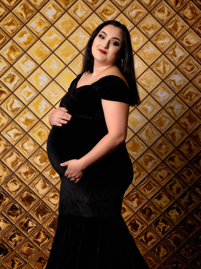 Pregnant woman in black dress during studio session with Prescott Arizona Photographer Melissa Byrne