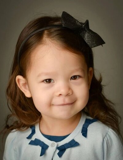 NJ child portrait headshot in studio with natural smile by Alex Kaplan Photography