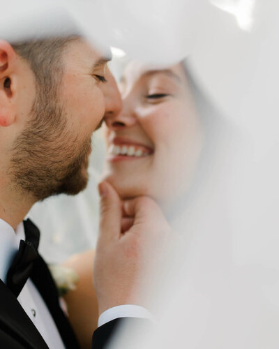 The couple shares a romantic embrace during their St. Pete elopement, beautifully captured in this intimate portrait. - Photography by Apt. B Photography