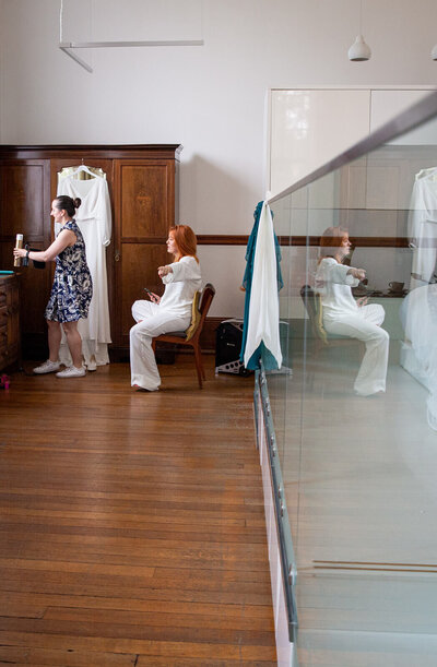 Bride in pyjamas getting ready at The Town Hall Hotel