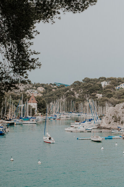 couple kissing and eloping on a mountain in the french alps