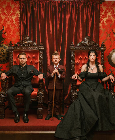 Bride and Groom and son in black for Satanic Temple Wedding