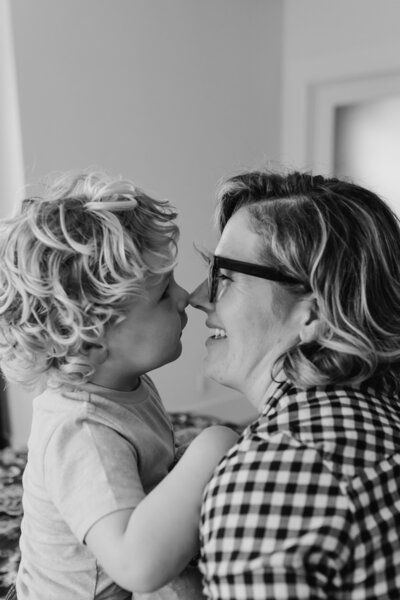 Family Photographer, woman and child smile nose to nose