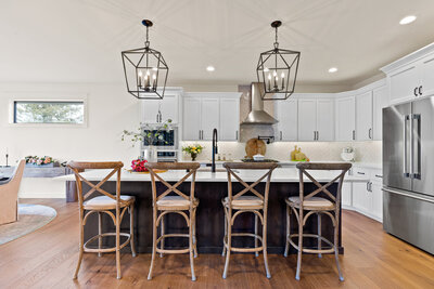 Bright, farmhouse kitchen of Canter Cottage new construction project designed by Coeur d'Alene interior designer Sarro Design.
