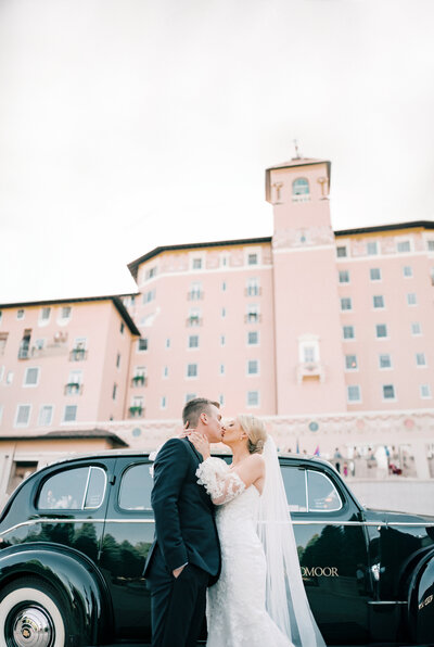 close up photo of bride with her eyes closed and veil over her face