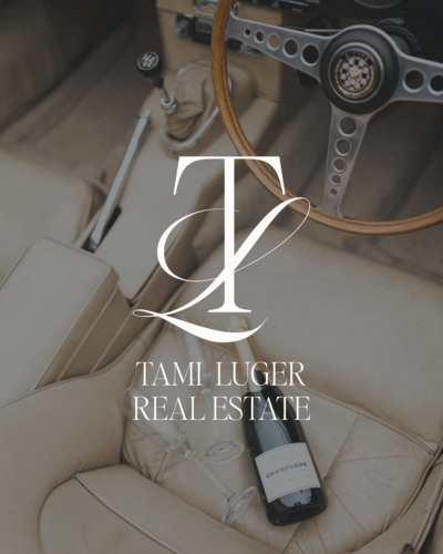 Champagne bottle and two glasses on the leather seat of a classic car, with the Tami Luger Real Estate logo by Sweet Pea Ink Creative overlaid in the center.