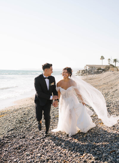 couple holding each other on the beach