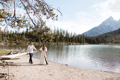 A frame elopement in the Finger Lakes region of New York showing a couple at an a frame cabin. Upstate New York elopement