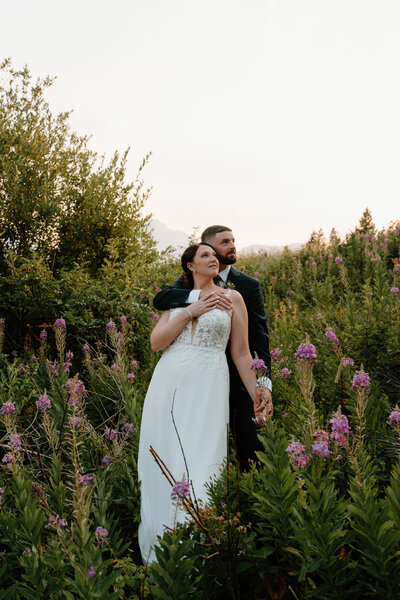 A couple eloping at sunrise at the base f the superstition mountains in Arizona.